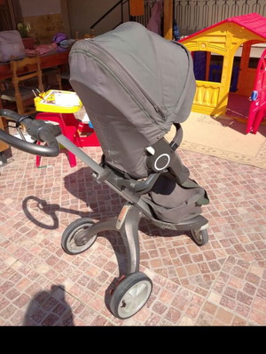 Stokke stroller with scooter, cup holder, umbrella and car seat