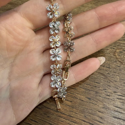 Bracelet with zirconia flowers, new, two-tone steel