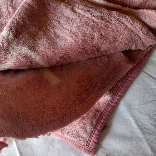 Double blanket used, warm, pink shades