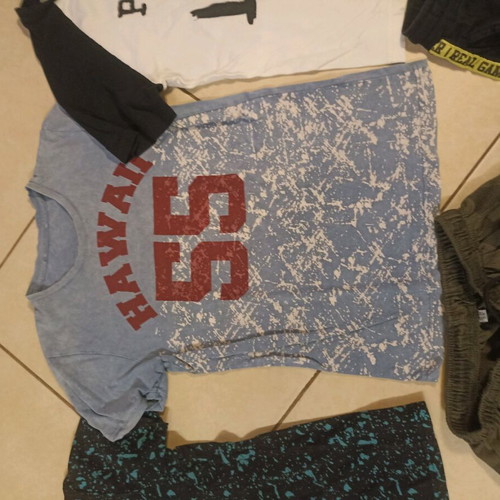 Pack of 4 used short-sleeve t-shirts for 9-year-old boy
