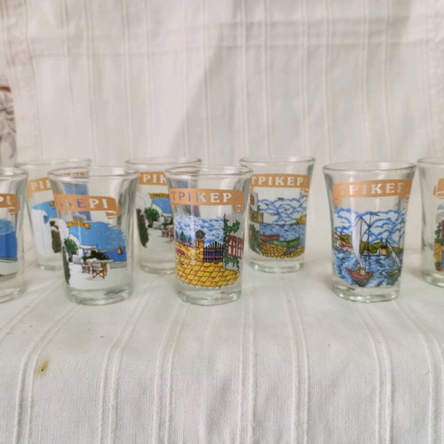 Set of 10 new shot glasses with designs and Trikeri inscription