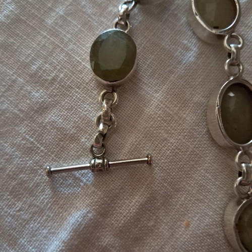 Silver bracelet with genuine green stones, like new