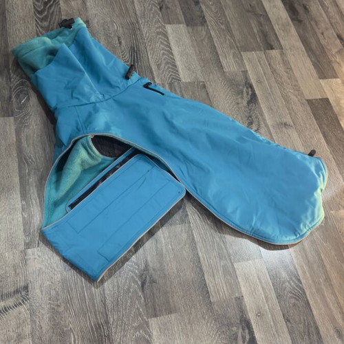Waterproof dog jacket like new with fleece lining in petrol color