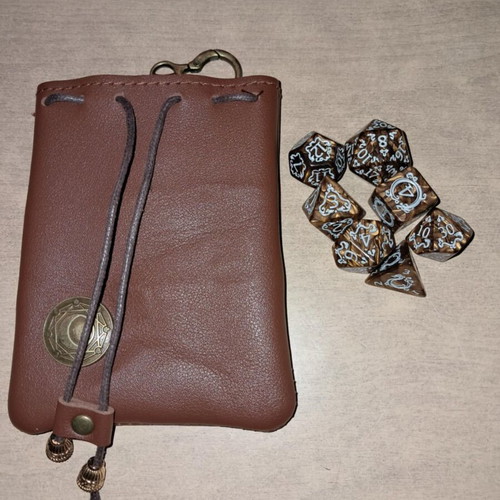 Brown leather dice bag with golden coffee D&D dragon dice