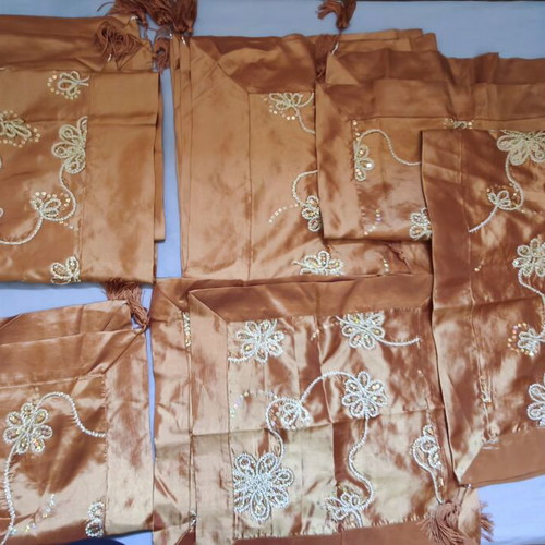 Set of 7 orange decorative table linens with embroidered flowers and beads