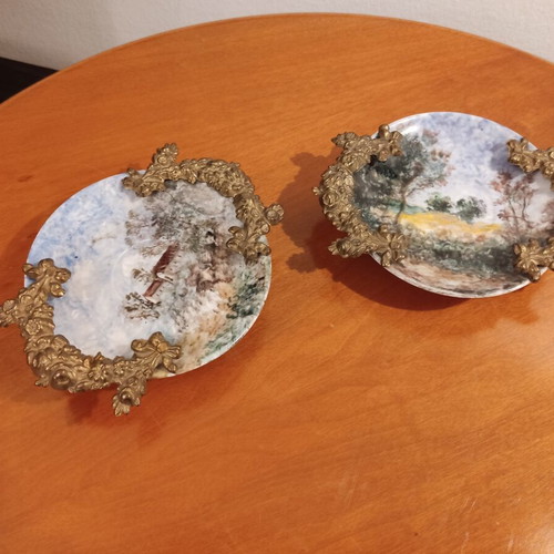 Andreas Zymatikas handpainted porcelain decorative plates, pair