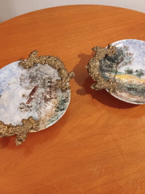 Andreas Zymatikas handpainted porcelain decorative plates, pair