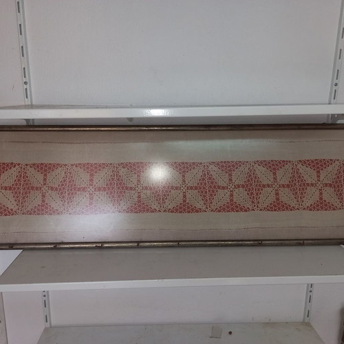 Vintage wall hanger used with glass and knitted interior