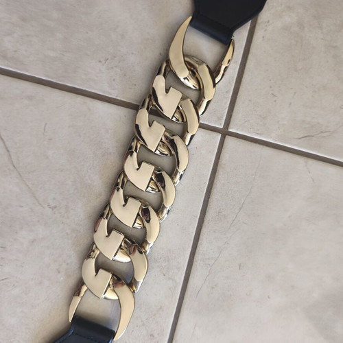 Celestino women's elastic belt with gold detail like new, adjustable size, black