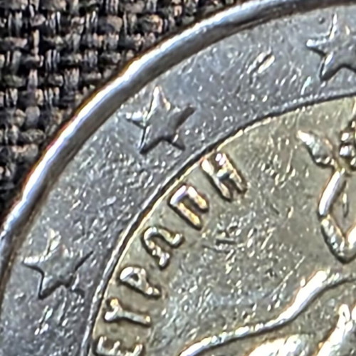 2 Euro 2002 Greece coin with 4 minting errors