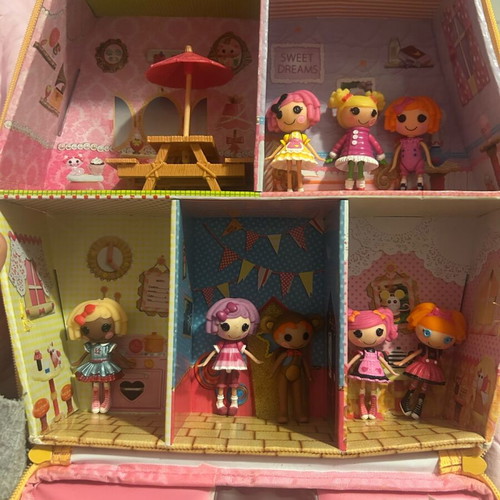 LaLaLoopsy playhouse suitcase like new with 8 small dolls without pets