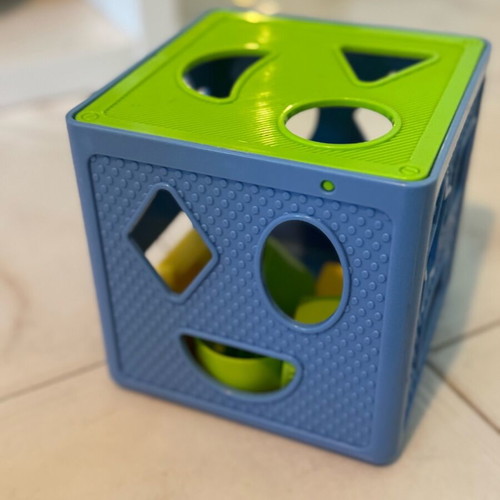 Shape sorting cube like new with blue and green colors