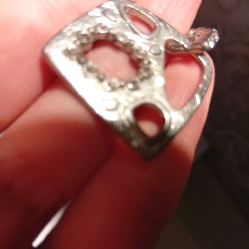 Pendant used with small diamonds and beautiful details silver