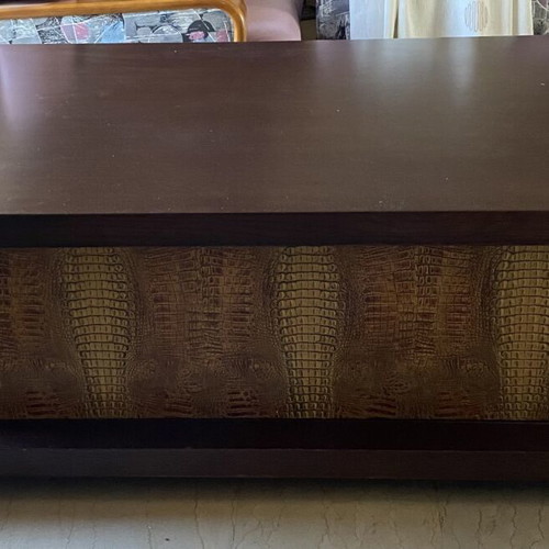 Coffee table like new with dark wood and crocodile leather texture