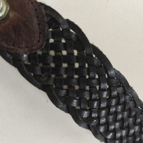 Leather bracelet used, black with brown details, sturdy weave