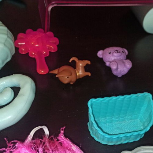 Barbie and other toys used, in moderate condition