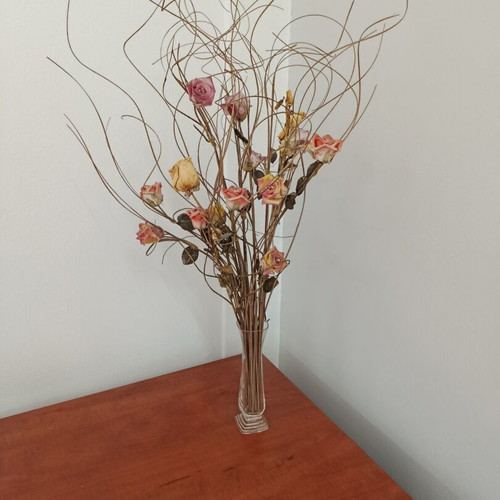 Vase with floral arrangement, pink base