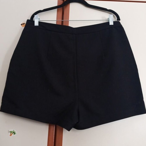 Black skort with pleats and decorative pockets, like new, size XL
