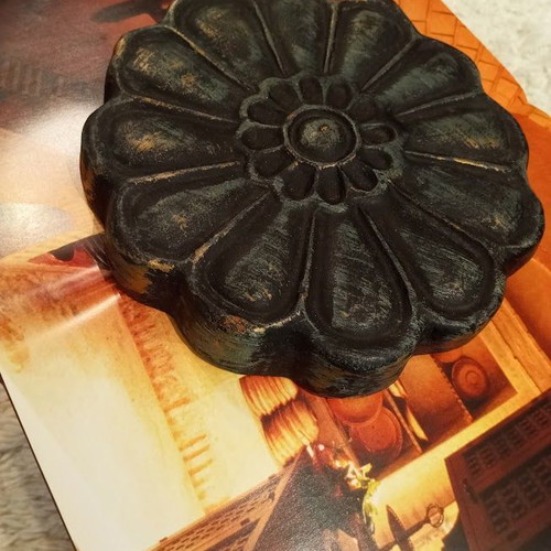Metal table used with ceramic decoration and antique finish