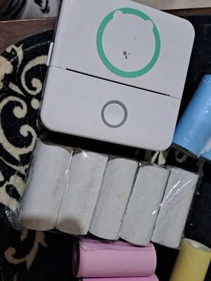 Portable Thermal Printer Bluetooth like new with extra paper rolls and stickers