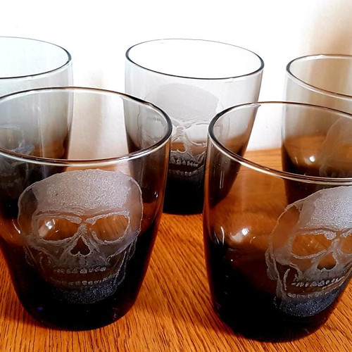 Collectible whiskey and vodka glasses, pack of 5, new with engraved skull