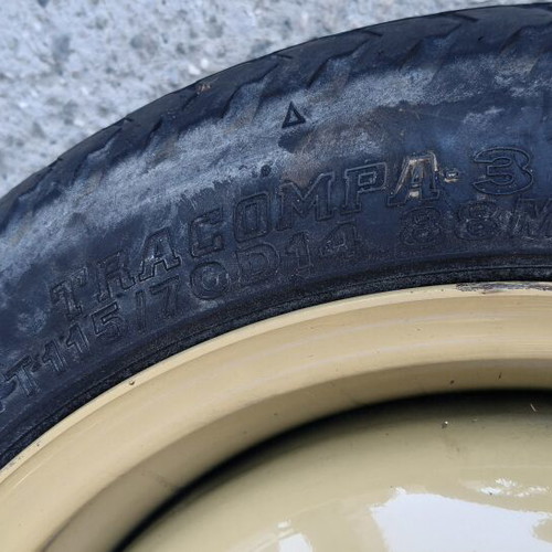 Tire saver T115/70D14 88M used, steel rim beige/yellow