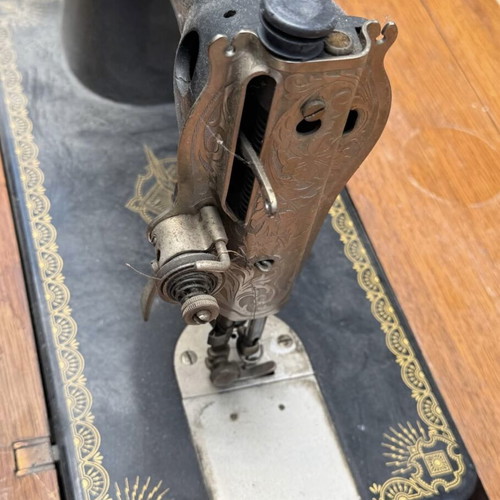 Singer sewing machine used with cabinet