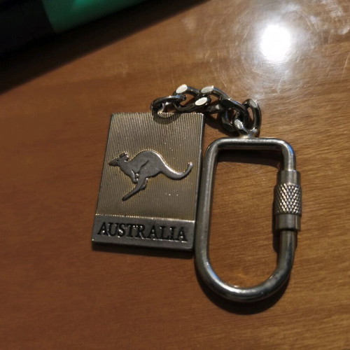 Collectible two-tone Australia keychain like new