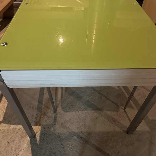 Glass dining table with extension and 4 used chairs, light green