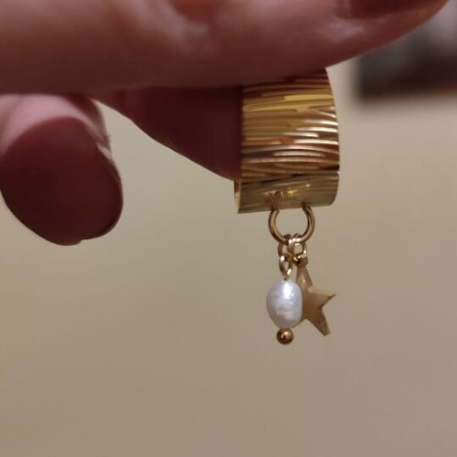 Gold-colored stainless steel ring new with star and pearl detail