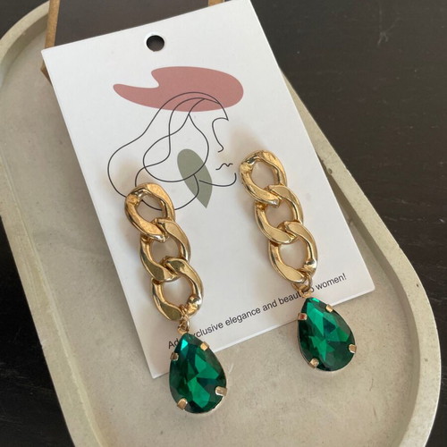 Earrings impressive new, steel with green stone