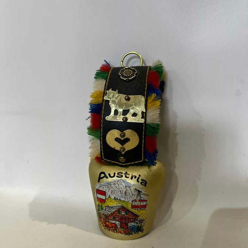 Vintage hanging souvenir bell from Austria used with colorful designs and metal elements