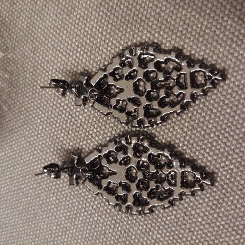 Dangling earrings with purple-eggplant crystals unused