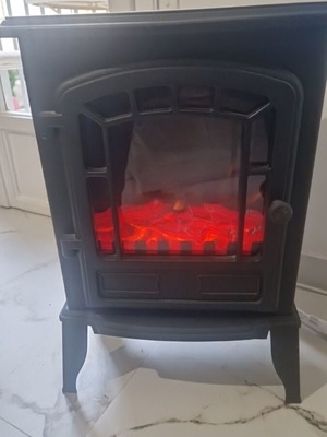 Electric fireplace used in classic vintage design, black color