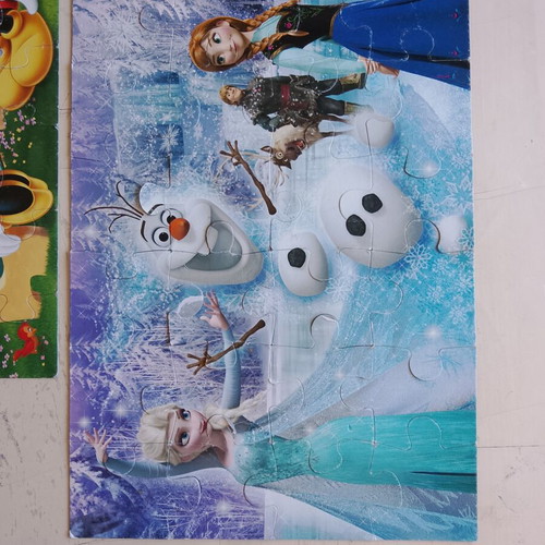 Disney puzzles pack of 4 used with Minnie, Mickey Mouse, Frozen