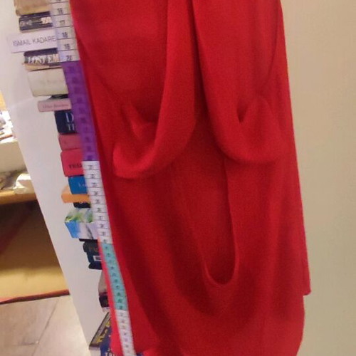 Red sleeveless flowing top used, size S, semi transparent material