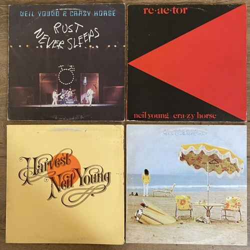 Neil Young 4 LP vinyl set like new, rock genre