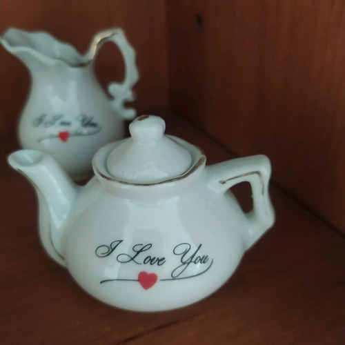 Miniature tea set used with gold line wear