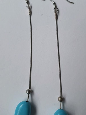 Long dangle earrings with bead