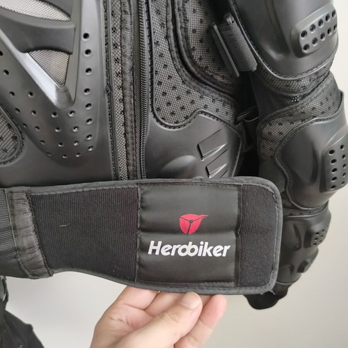 Perforated motorcycle jacket like new with plastic protections, medium size
