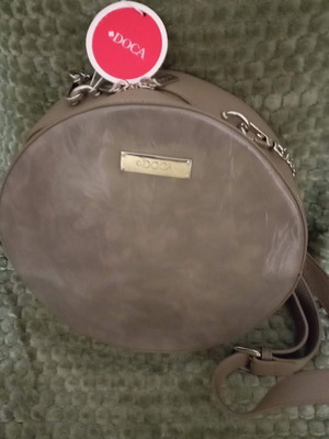 Doca round shoulder bag brown like new with patent side