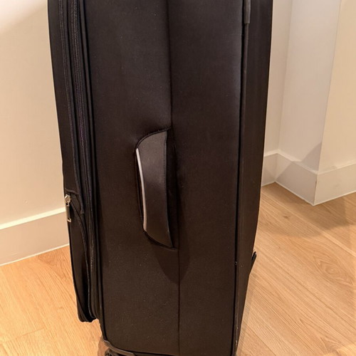 Large wheeled travel suitcase like new, black