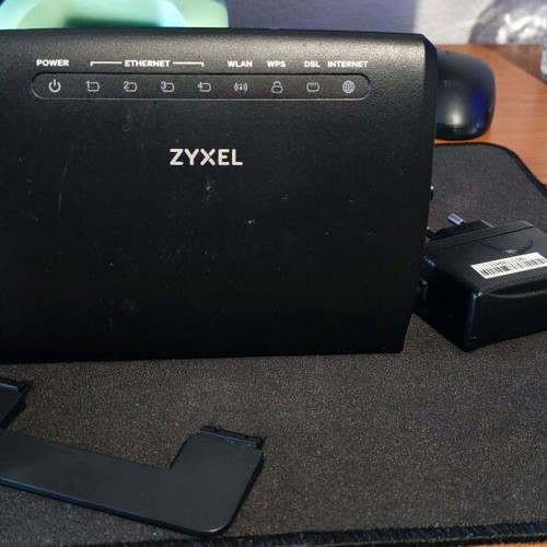 Three old routers, fully functional