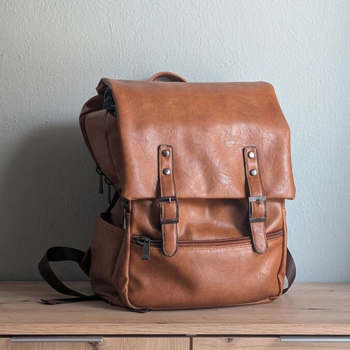 Vintage unisex backpack in brown faux leather with laptop compartment