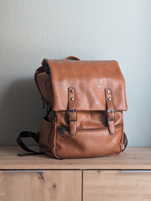 Vintage unisex backpack in brown faux leather with laptop compartment