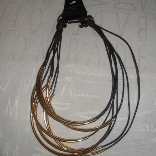 Women's jewelry set with gold-tone metal elements, boho-minimalist style