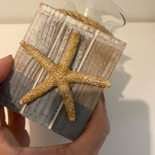 Candlestick with starfish decoration