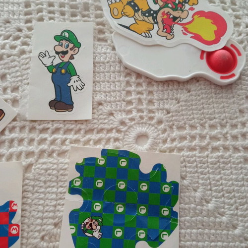 Super Mario Kinder Joy Stickers and Pop It like new