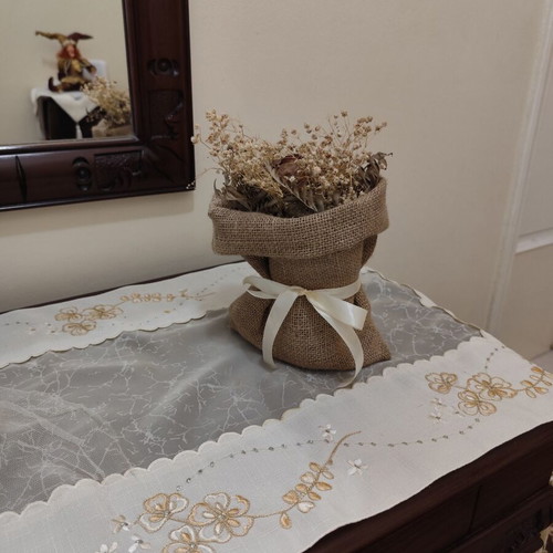 Decorative sack with dried flowers like new