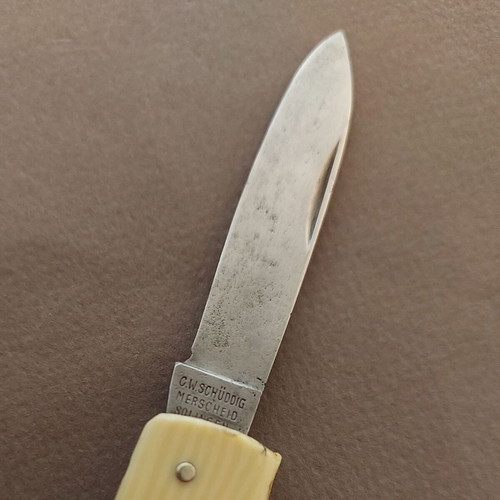 Antique German Schuddig Solingen pocket knife used with double blades and silver inlay decoration
